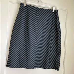 A classic dark denim skirt with fine gold/white stripes.  26”waist, Length 21”